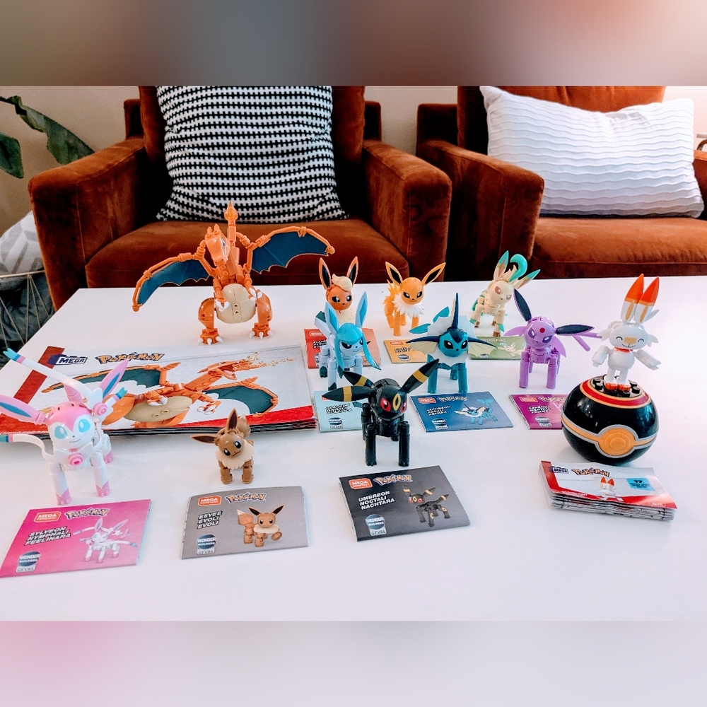 Mega Pokemon Charizard, Evee Evolutions  and Construx Scorbunny sets (lego type)
